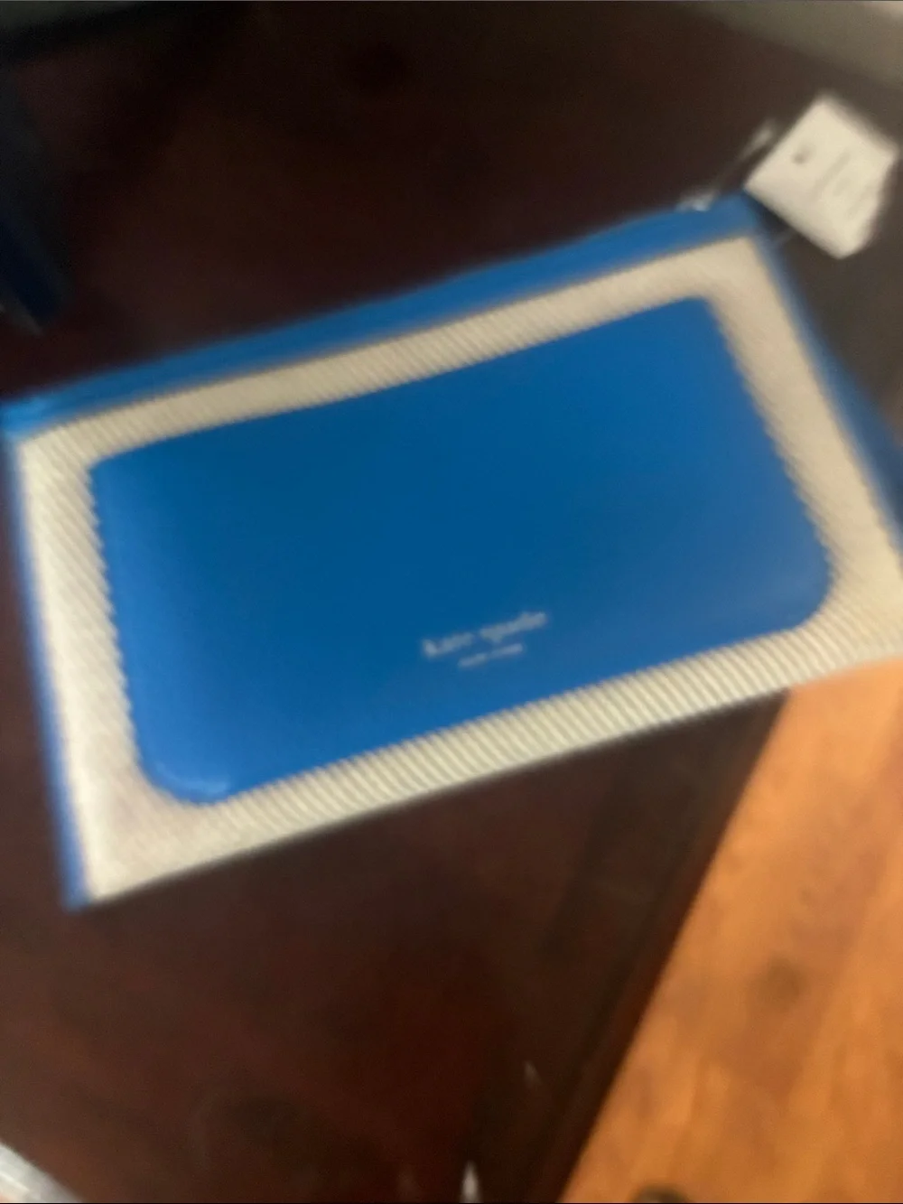kate spade bright blue wristlet with contrast trim